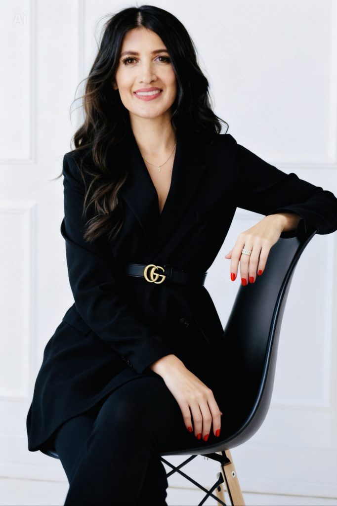 Nadia Alexander-Khan British Film Producer and AI Marketing Strategist in black suit portrait representing leadership and behavioural science marketing